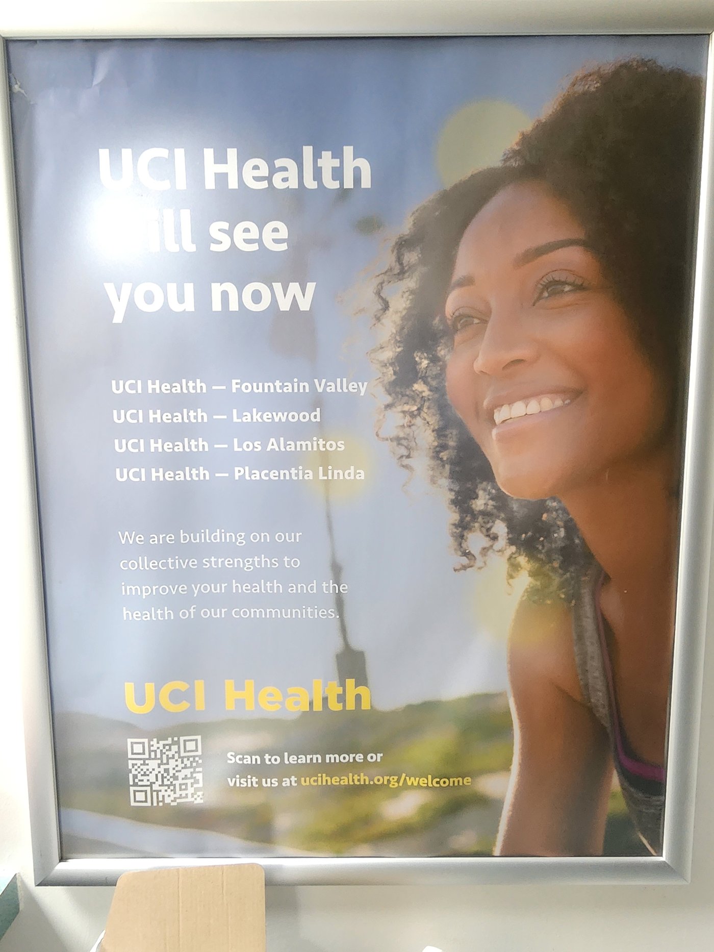 UCI Health Will See You Now framed poster installed in clinical environment featuring four-hospital Community Network